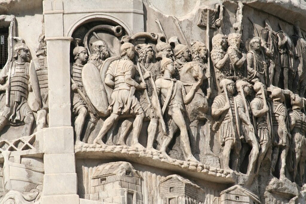 Marble relief carving depicting armed soldiers in formation with shields and spears
