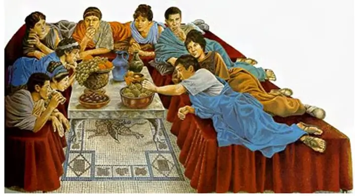 Manuscript drawing of multiple figures reclining around a table with food and vessels