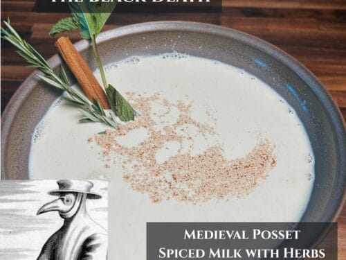 Grey bowl of pale liquid dusted with cinnamon, garnished with rosemary and mint sprigs